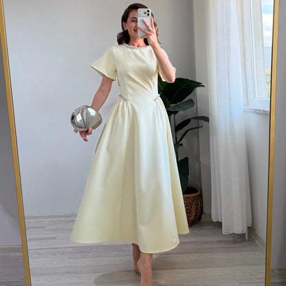Elegant Pearl-Embellished Short Sleeve Round Neck Midi Dress – 2026 Summer Collection